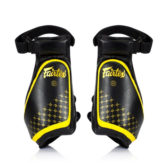 Protège cuisses Fairtex noirs & jaunes compacts